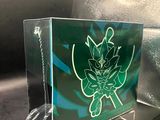 a glass box with a picture of a leaf on it