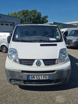 the white van is parked in a parking lot with other vehicles