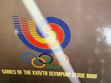 an image of a picture of the olympic logo on the back of a train