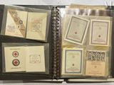 a book with a bunch of cards on top of it