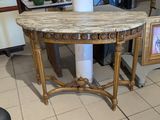a marble top table with a marble top on it
