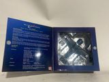a blue box with a picture of the inside of it