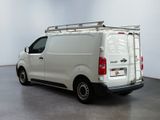 a white van that is parked in a room