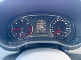 a close up of a car dashboard with a speedometer and gauges