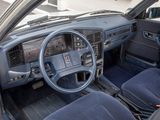 dashboard of a car with blue seats and a steering wheel