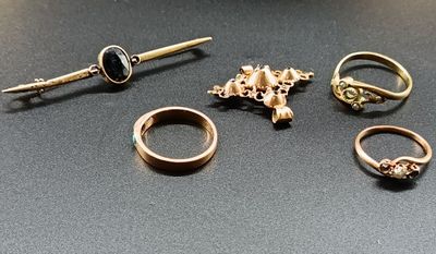 five different types of rings on a table