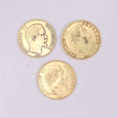 trois pièces d'or portant l'image d'un homme et d'une femme