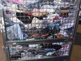 a large metal cart with many items in it