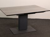 a square table with a metal base and a wooden top