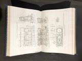 an open book with a drawing of a train on it