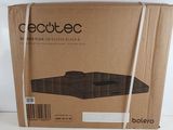 packaging of a box with a laptop on it sitting on a table