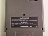 an image of a nintendo game console with a game card attached to it