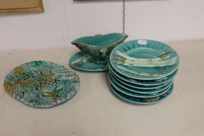 a lot of plates that are sitting on a table