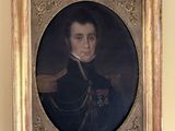 portrait d'un homme en uniforme militaire dans un cadre doré
