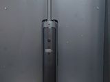a vacuum that is sitting on a wooden table
