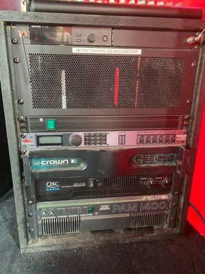 a rack with a bunch of electronic equipment on it