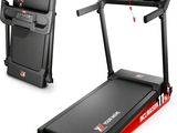 a close up of a treadmill with a monitor on top of it