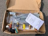 a cardboard box with a bunch of hoses in it