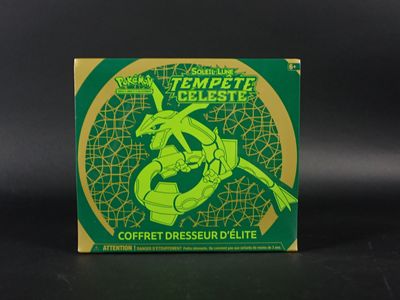 une boîte verte sur laquelle est représenté un lézard