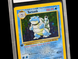 a close up of a pokemon card on a black background