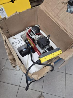 a box full of assorted items sitting on the floor