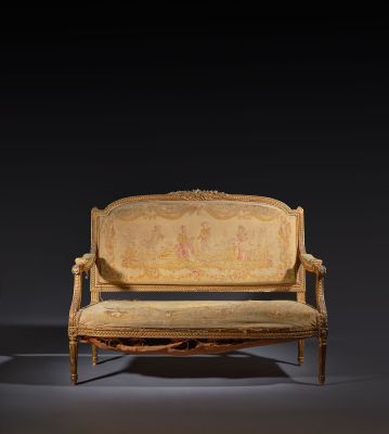 an image of a couch and a chair in a dark room