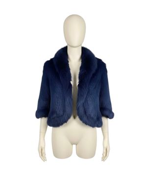 the mannequin is wearing a blue jacket and white shirt