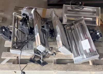 many different types of heaters sitting on a pallet