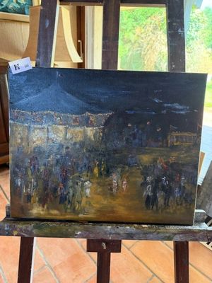 une image d'un tableau sur un chevalet dans une pièce