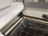 a machine that has a screen on the inside of it