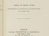 an open book with a black and white title on it