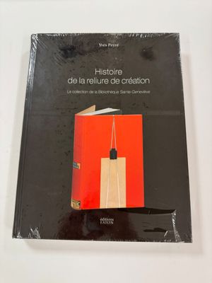 the cover of a book with a picture of a skyscraper in the background