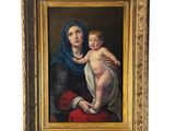 une peinture représentant une femme tenant un bébé dans ses bras