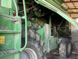 a tractor that is parked inside of a building
