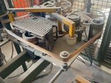 a picture of a machine that is working on a piece of wood