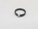 an image of a black ring with a diamond on it