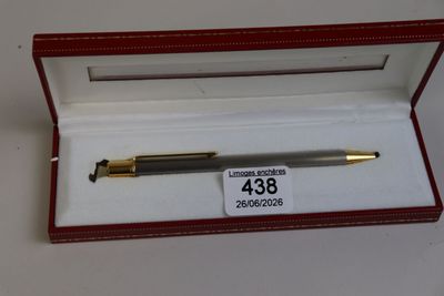 a pen in a box with a price tag on it