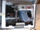 an image of a box with a drill and a drillet in it