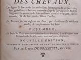 an open book with a black and white title on it