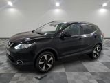 Nissan QX-V SUV dans un showroom au sol à damier