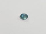 a blue diamond on a white surface