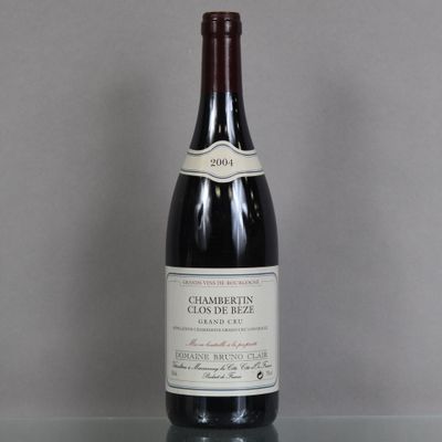 a bottle of wine that is sitting on a table
