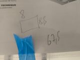a piece of tape taped to a piece of paper