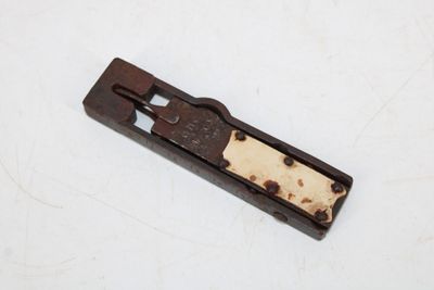 an image of a piece of wood that has been used as a tool