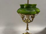 pair of antique brass and green glass lamps on stands