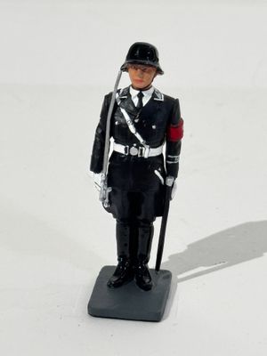 a figurine of a man dressed in a uniform