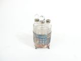 two salt and pepper shakers sitting on top of each other