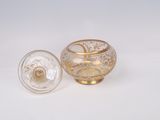 an image of a small glass bowl and a small glass bowl on a white surface