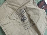 a close up of a military uniform with a tag on it