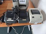three different types of electronic devices on a table